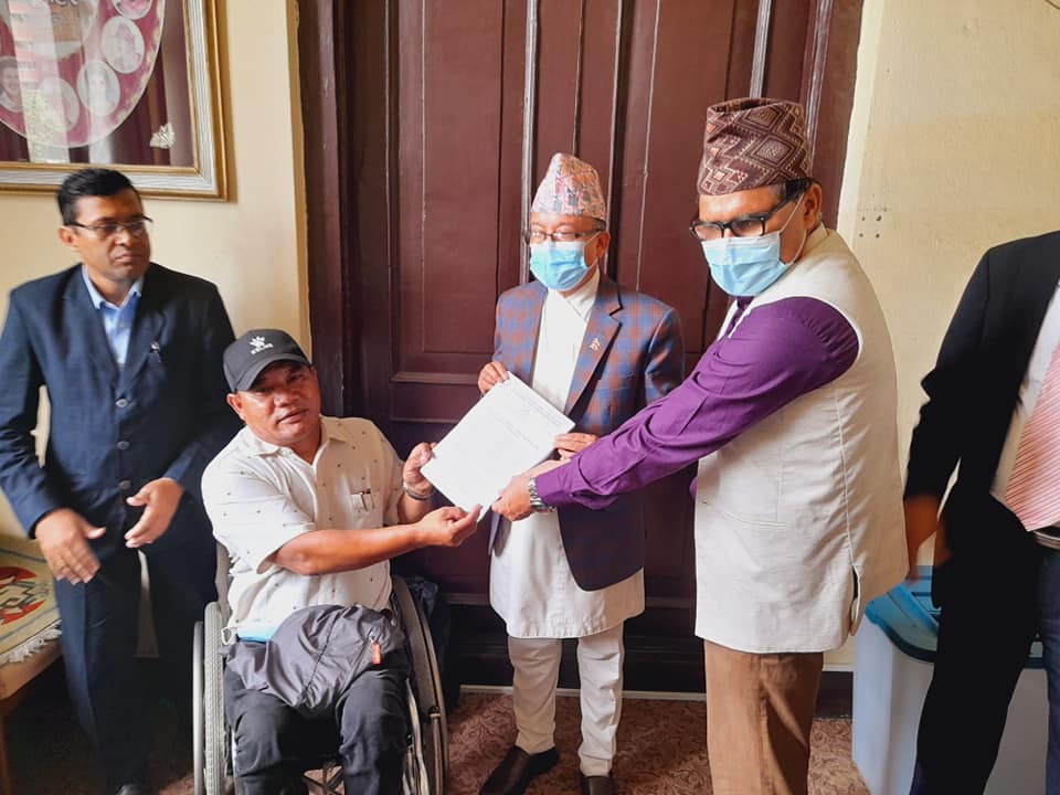 President of CIL-Kathmandu along with president of NFDN is handing over the memorandum to Chief Election Commissioner